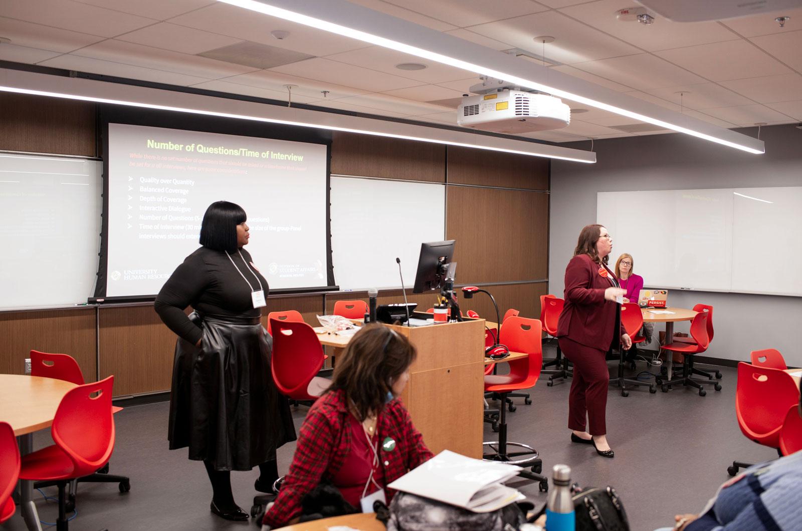 Rashida Bailey & Amy Swartz presenting in a classroom